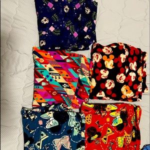 5 new Lularoe Disney maybe worn 1 time no piling Tall And curvy